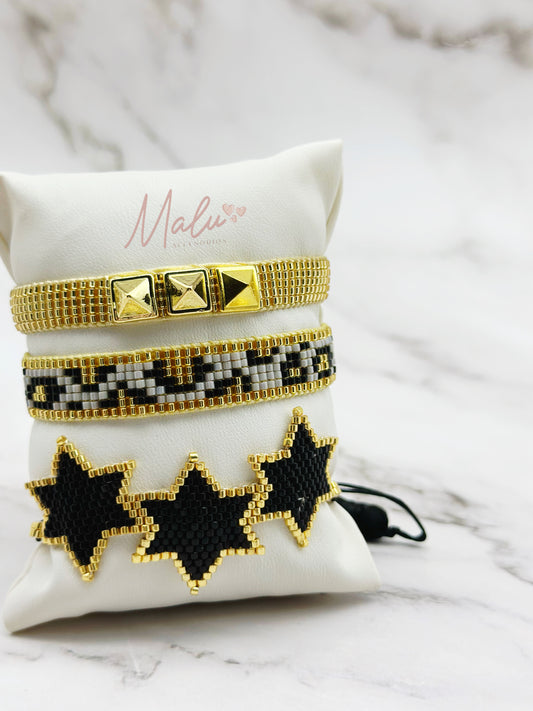 Set of Gold and Black Star Bracelets