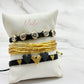 Set of Gold and Black Hearts Bracelets